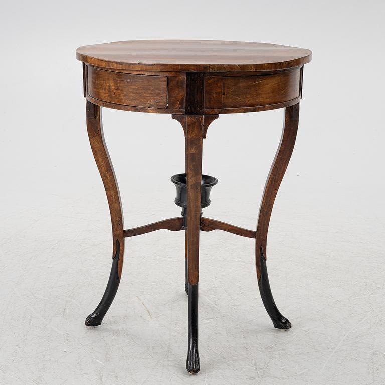 An Empire table, northern Europe, early 19th century.