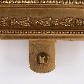 A pair of Swedish Empire mirror wall sconces, first half of the 19th century.