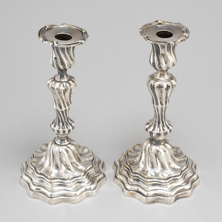 A pair of Louis XV mid 18th century candlesticks.