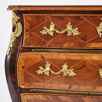 A Swedish parquetry rococo corner-commode, Stockholm later part 18th century.