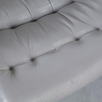 A COUPLE OF BRUNO MATHSSON ARMCHAIRS.