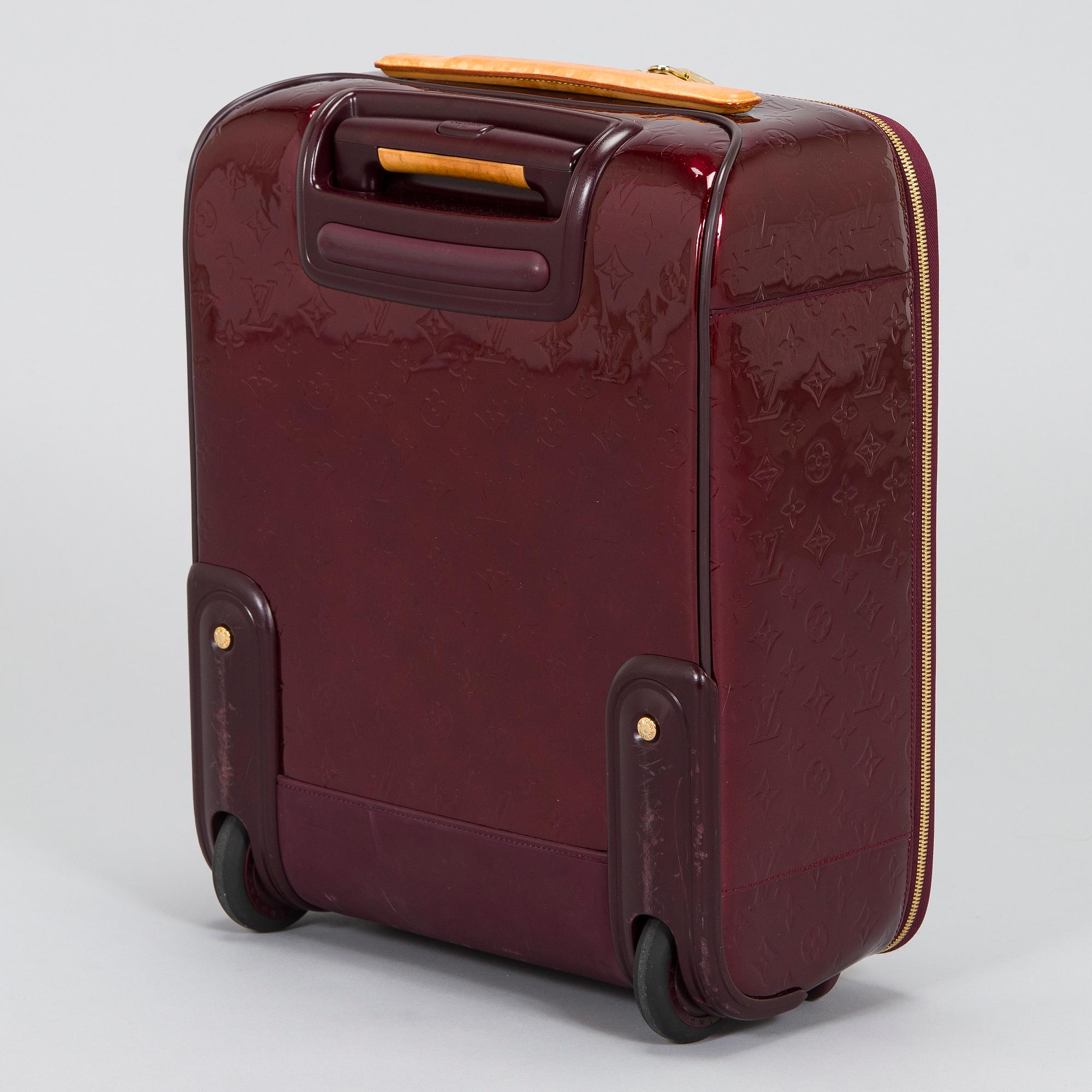 Louis Vuitton, a Monogram Vernis 'Pégase 45', suitcase.