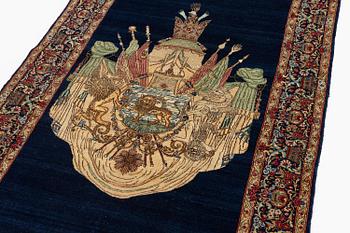 A semi-antique pictoral 'Lion and Sun' Kerman rug, c. 243 x 144 cm.