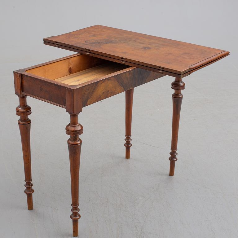 A late 19th century mahogany card table.