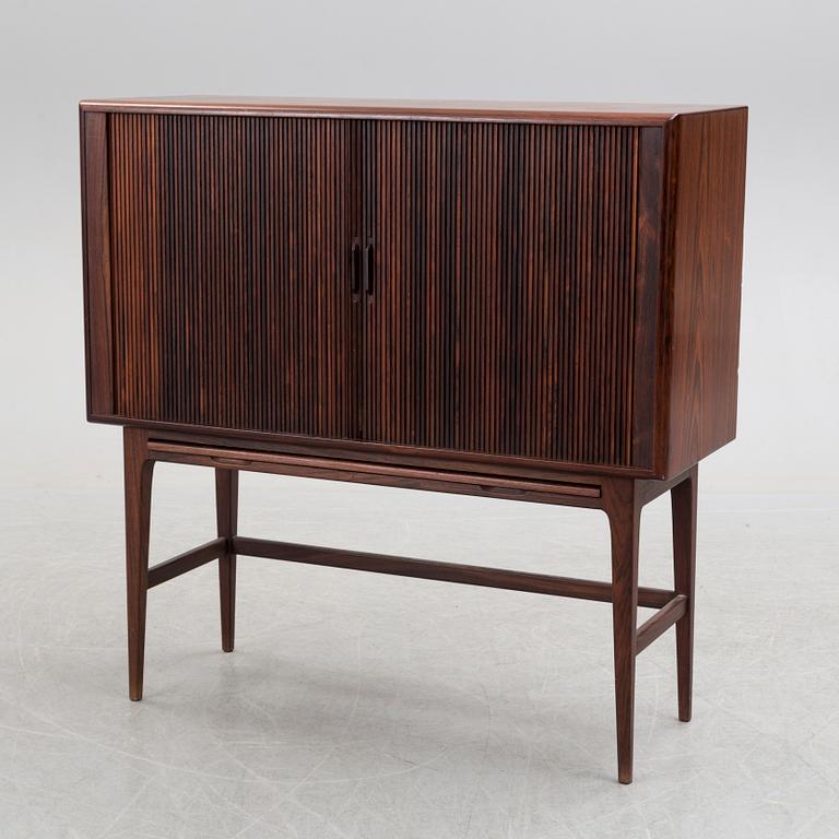 KURT ØSTERVIG, a Danish rosewood veneered drinks cabinet, 1960's.