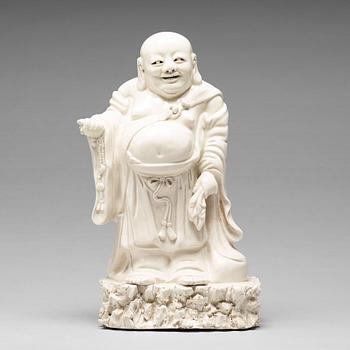 788. A blanc de chine figure of Buddai, Qing dynasty.