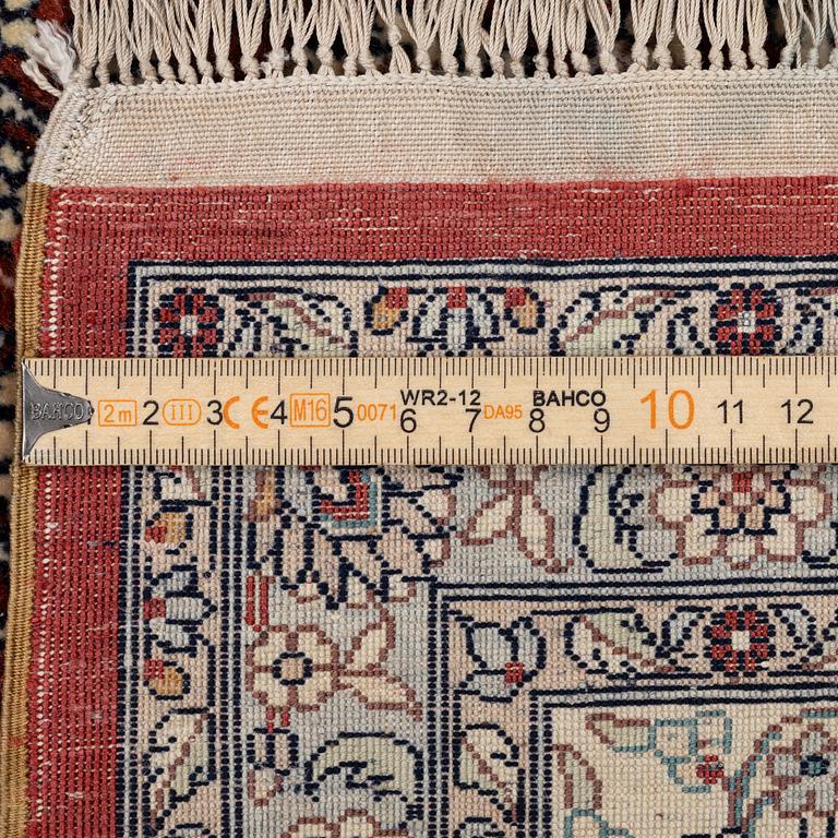 Carpet, part silk, approx. 240 x 158 cm.