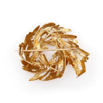 BROSCH, 18K guld. Total vikt 19 gram.