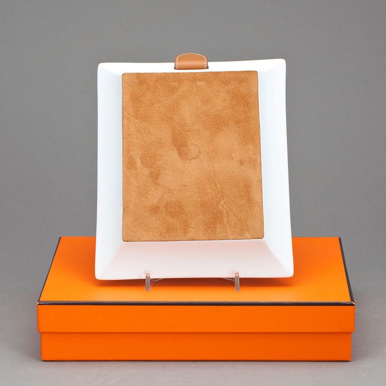 HERMÈS, a unglazed porcelain tray.