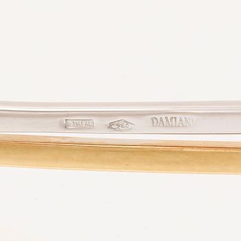 An 18K white- and yellow gold necklace with round brilliant cut diamonds and cultured Tahitian pearls, Damiani Italy.