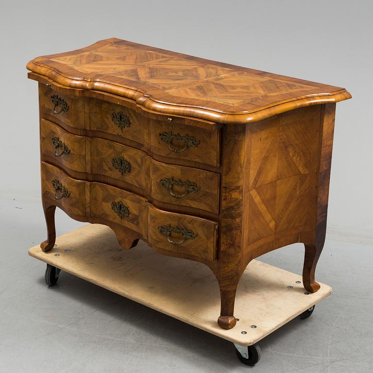 A late baroque mid 18th century chest of drawers by Christian Linning.