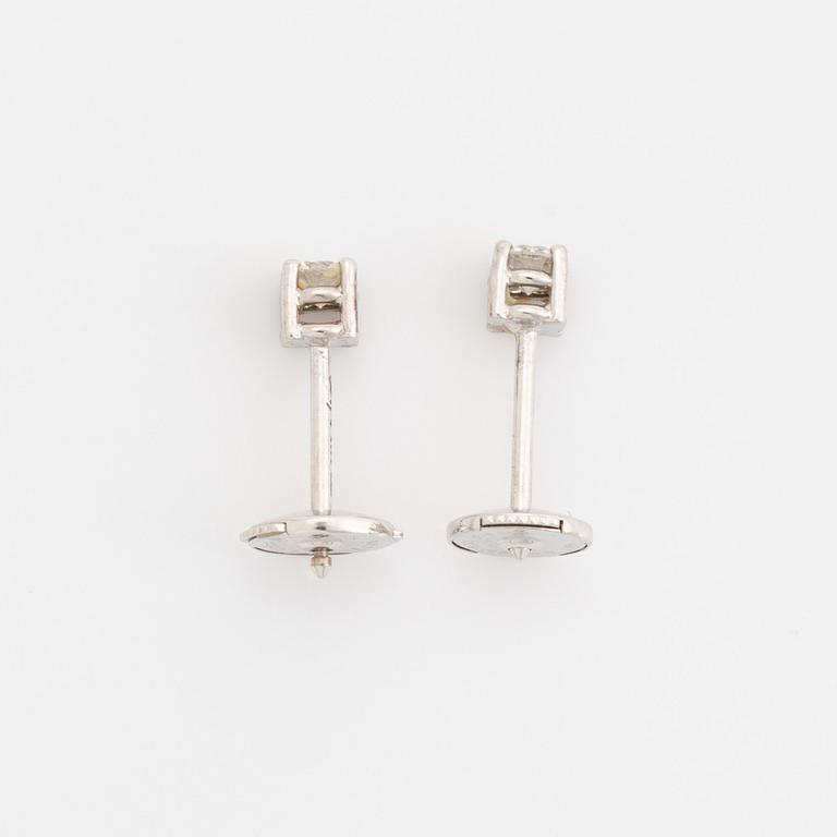 Brilliant-cut diamond earrings.