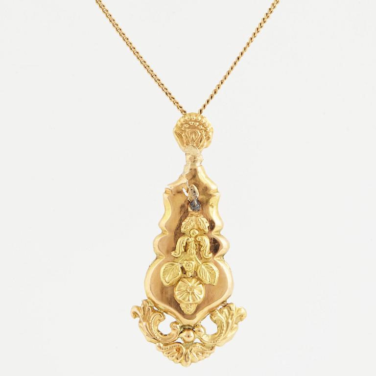 HÄNGE, med kedja. 18K guld.