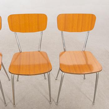 A Salvazini table and four chairs Italy 1950s.