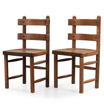 42. A pair of Axel Einar Hjorth stained pine 'Sandhamn' chairs, Nordiska Kompaniet 1932.