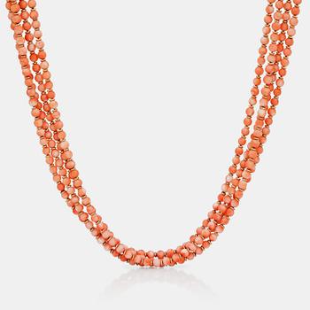 A coral bead, 0.68ct brilliant-cut diamond and gold rondel necklace. Two additional coral drops included.