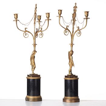 A pair of late Gustavian three-light chandeliers, circa 1800.