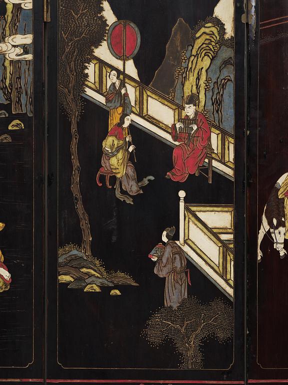 A Chinese four panel lacquer folding screen, first part of the 20th century.