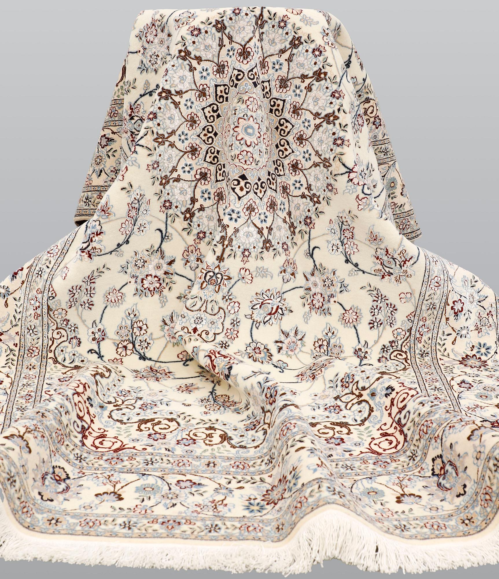 A Nain part silk carpet, 244 x 156 cm.