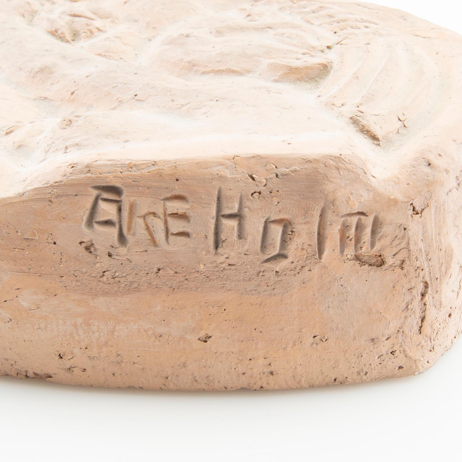 Åke Holm, wall relief signed.