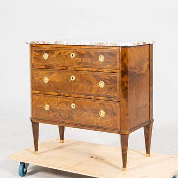 A Gustavian style mid 1900s mahogany dresser.
