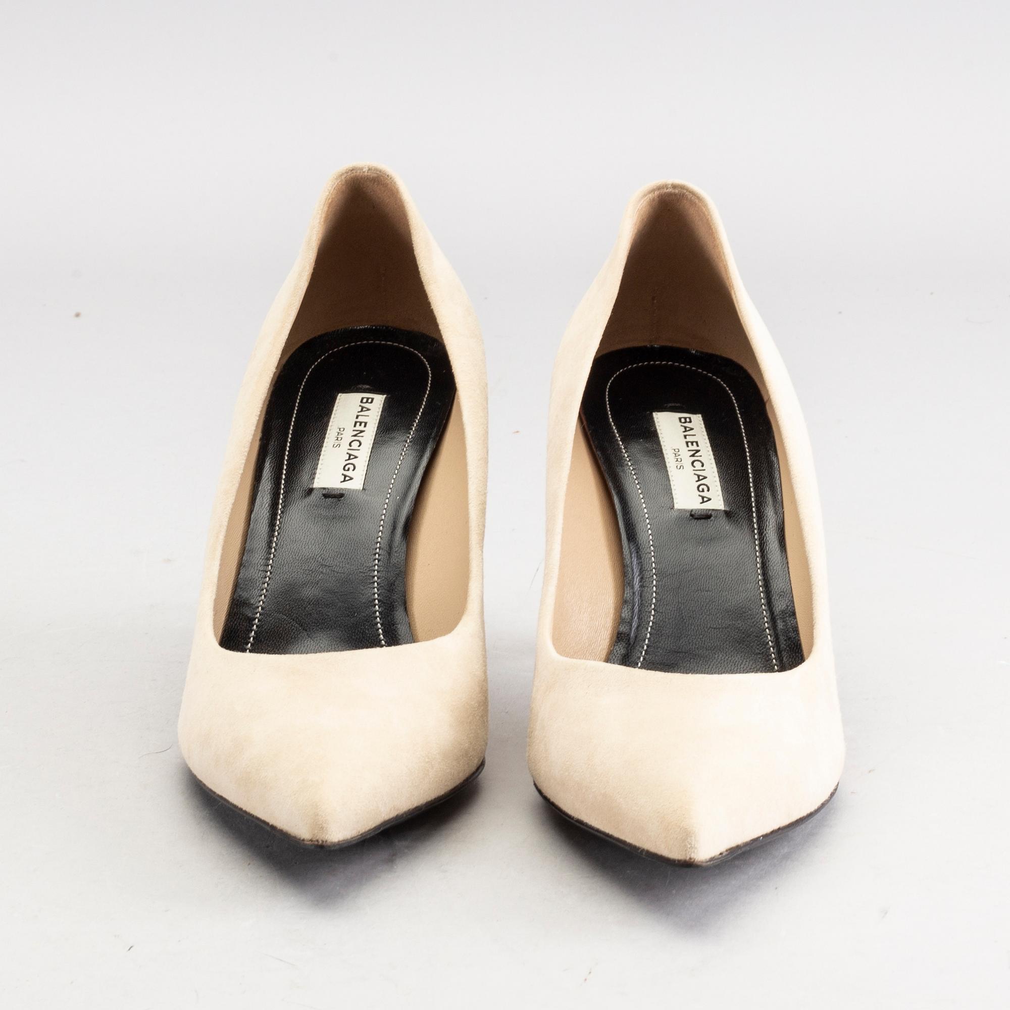 A pair of Balenciaga beige suede shoes size 38.