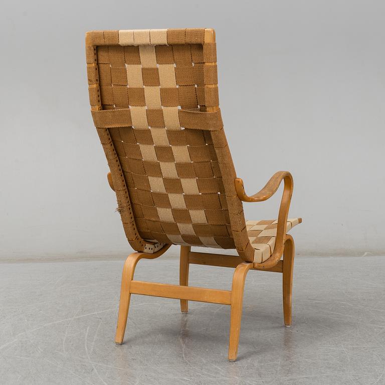 A armchair, model "Eva hög", designed by Bruno Mathsson for Firma Karl Mathsson, dated 1941.