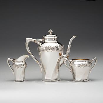 A C.G. Hallberg three pieces Art Nouveau silver coffee service, Stockholm 1904-1905.