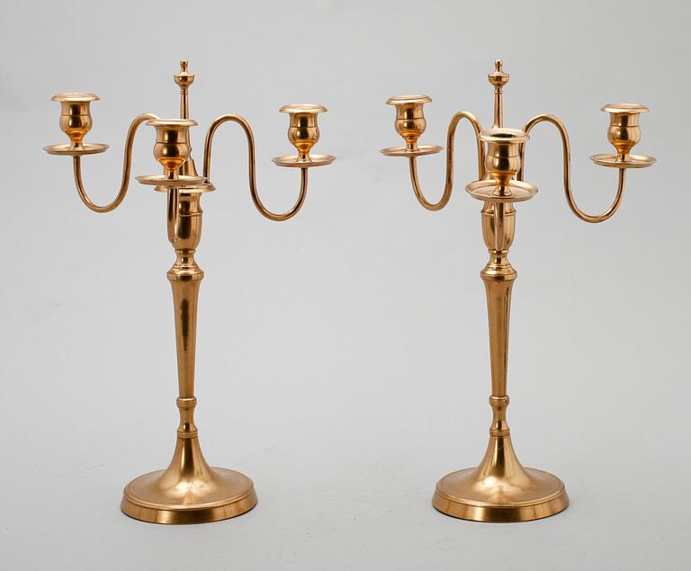 KANDELABRAR, 1 par, mässing, Torshammars Bruk, tidigt 1900-tal.