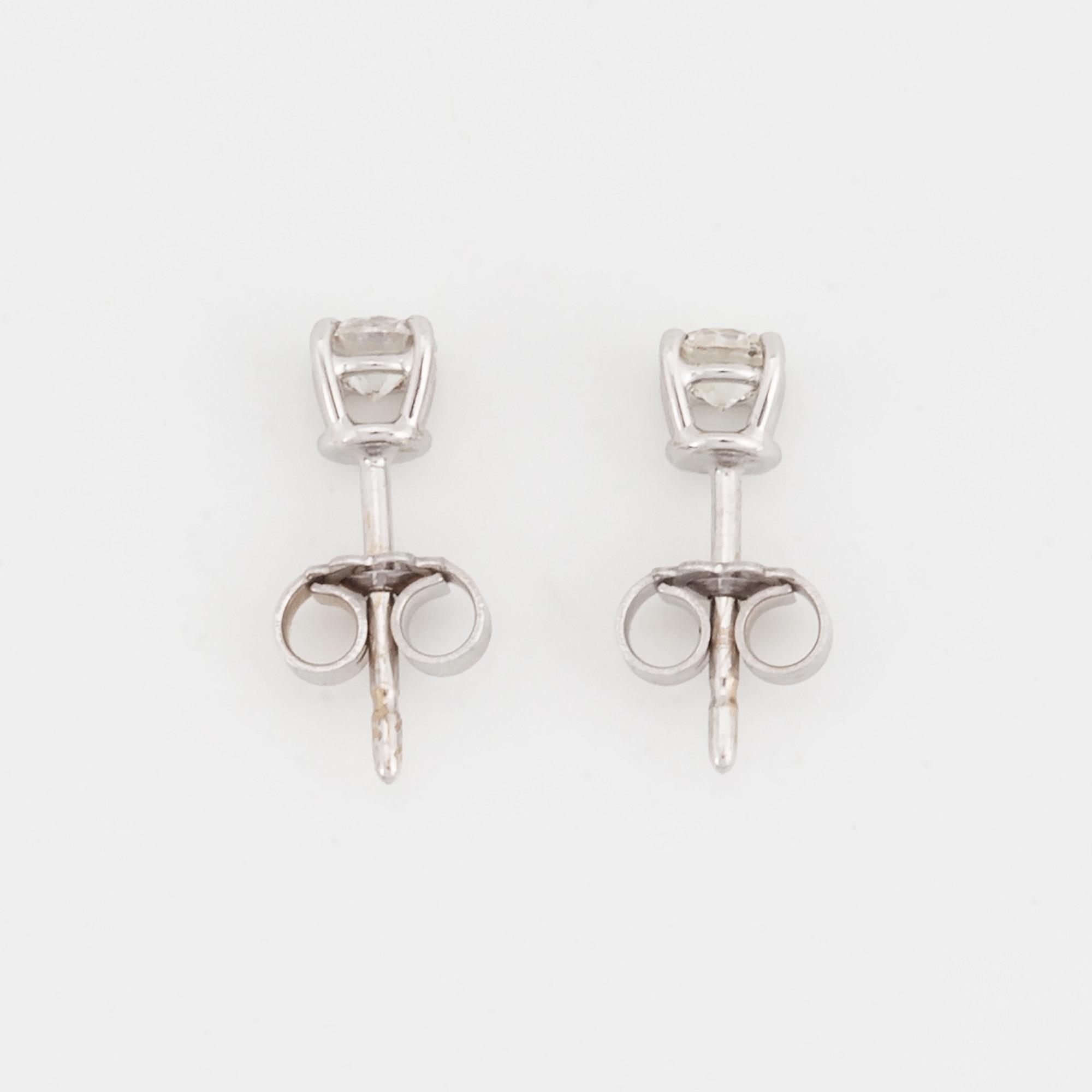 Brilliant-cut diamond earrings.