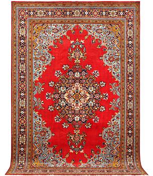 A Tabriz carpet, c. 333 x 214 cm.