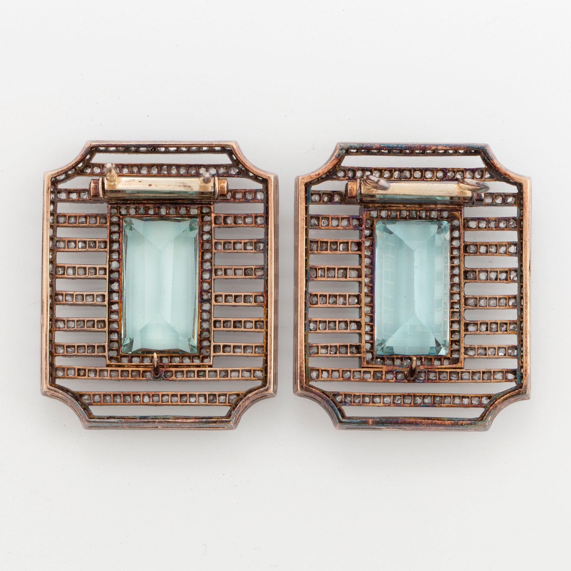 Fabergé, verkmästare Albert Holmström, dubbelclip, guld, akvamariner och diamanter, S:t Petersburg 1904-1912.