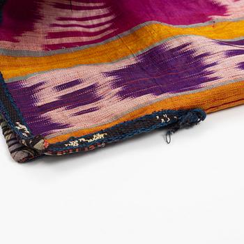 A woman’s Chapan, silk and cotton Ikat, Central Asia, 1880s.