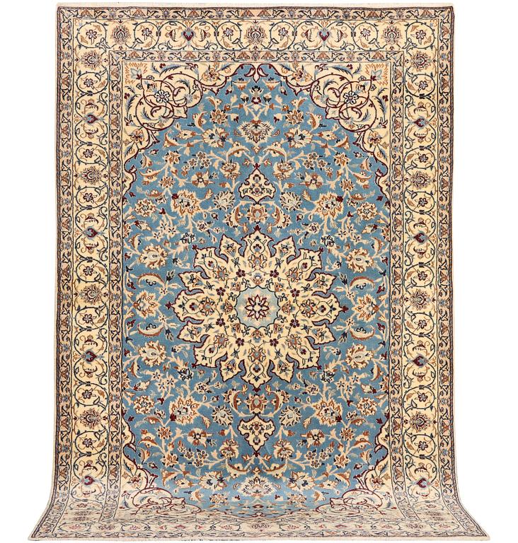 A Nain, part silk carpet, c. 196 x 120 cm.