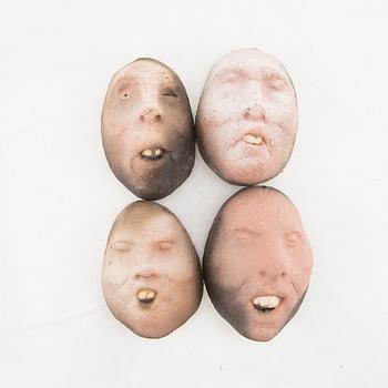 Johan Thunell a set of seven signed ceramic sculptures.