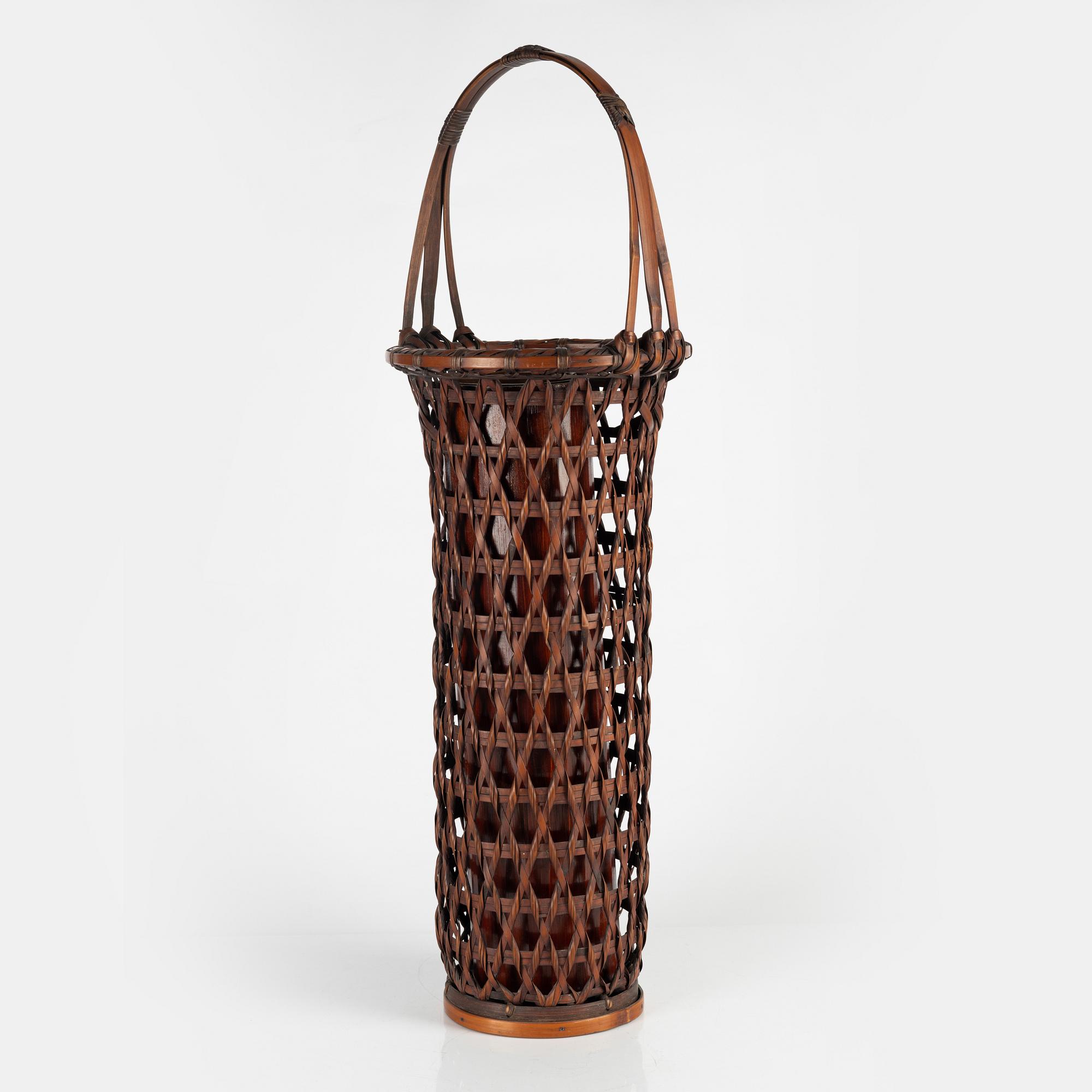 A Japanese Ikebana flower basket, 20th Century. Signed.