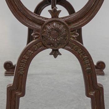 a cast iron and marble table from Corné & Cie Toulouse, around 1900.