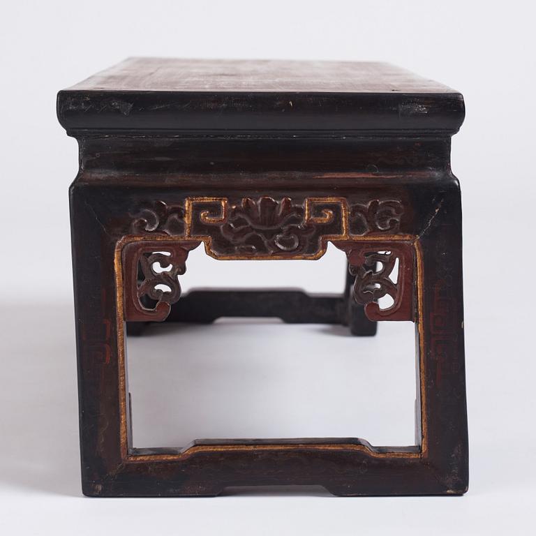 A Chinese lacquered Kang table, Qing dynasty.