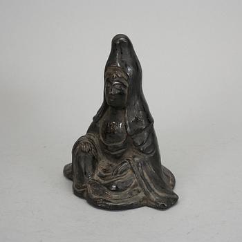 A potted black glazed Kannon, Japan, Edo period (1603-1868).