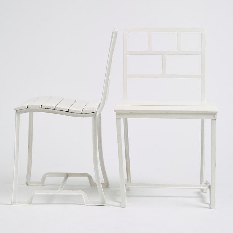 Carl Hörvik, a pair of white lacquered iron garden chairs, possibly manufactured by Thulins vagnsfabrik, Sweden.