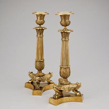 LJUSSTAKAR, ett par, brons, empirstil, 1800-tal.