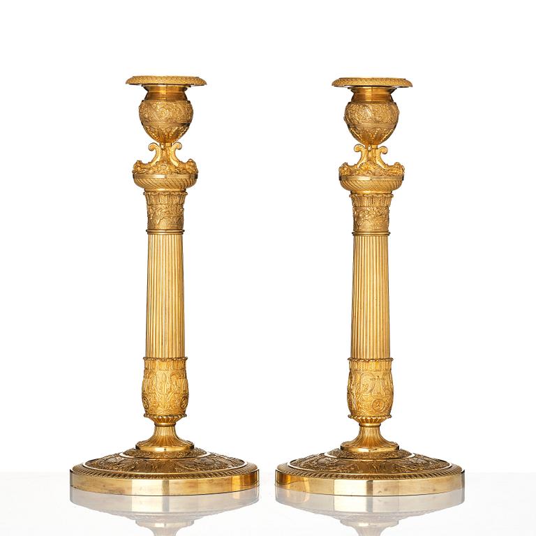 A pair of French Empire candlesticks, early 19th century.