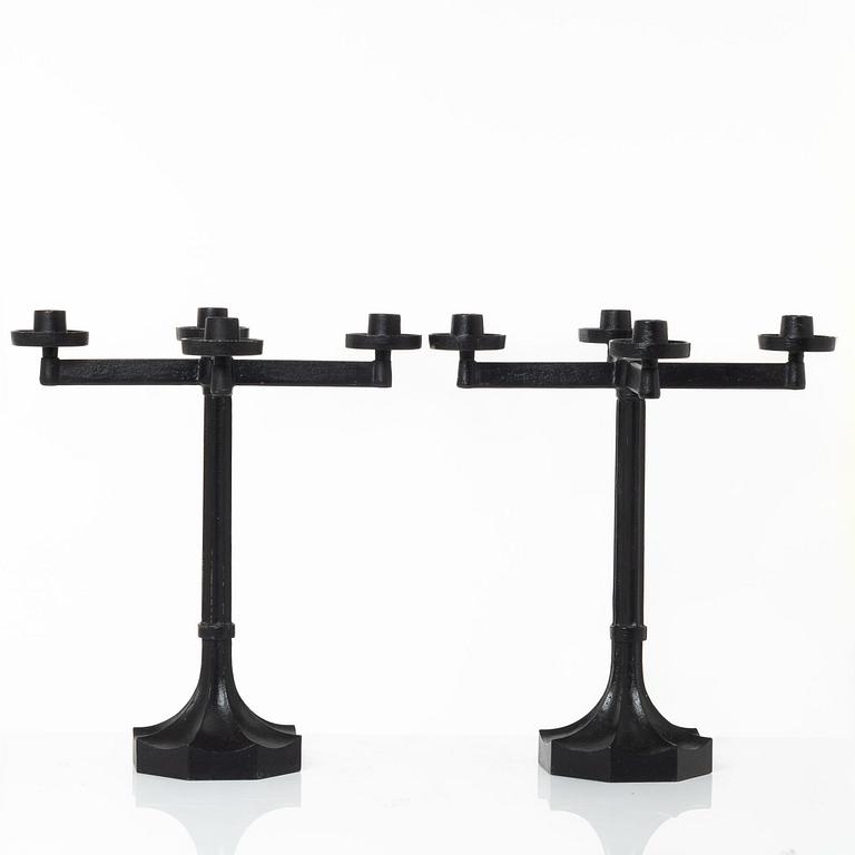Sigurd Persson, a pair ofa cast iron candelabras, Kockums 1965.