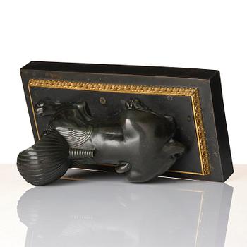 A French Empire bronze sfinx.