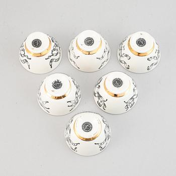 Piero Fornasetti, a set of six porcelain bowls, Milan, Italy.