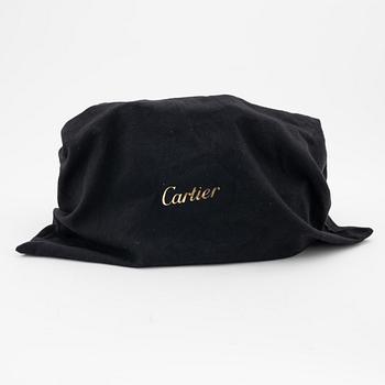 Cartier, a black leather handbag.