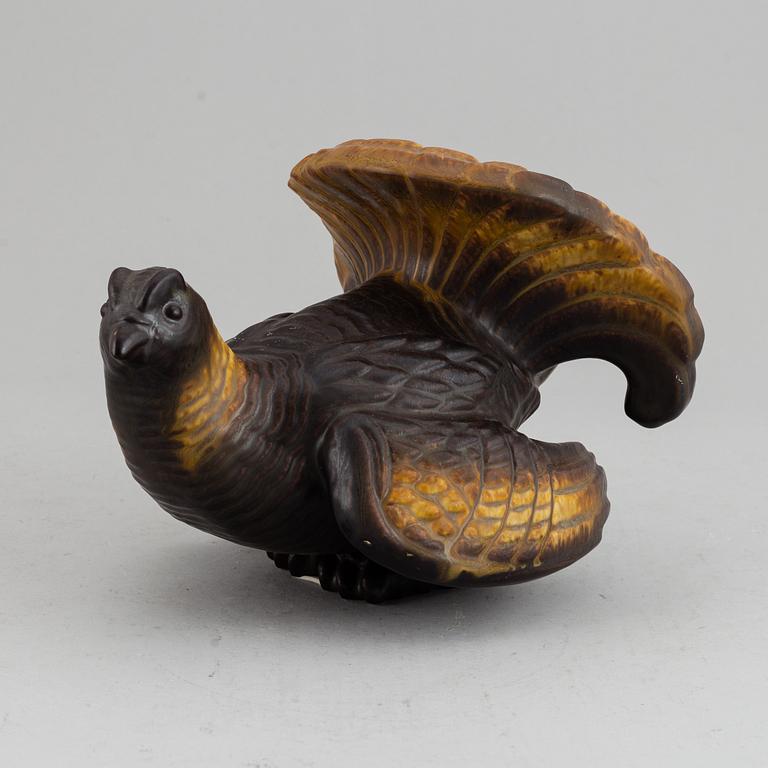 A Gunnar Nylund figure of a wood grouse, Rörstrand, 20th Century.