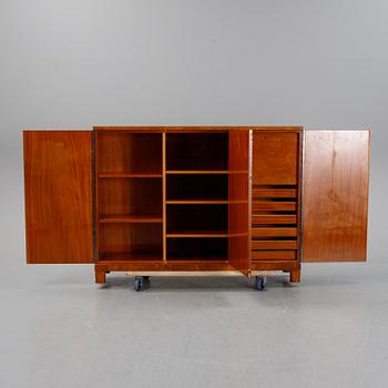 A 1940's Swedish Modern mahogany veneered cabinet.