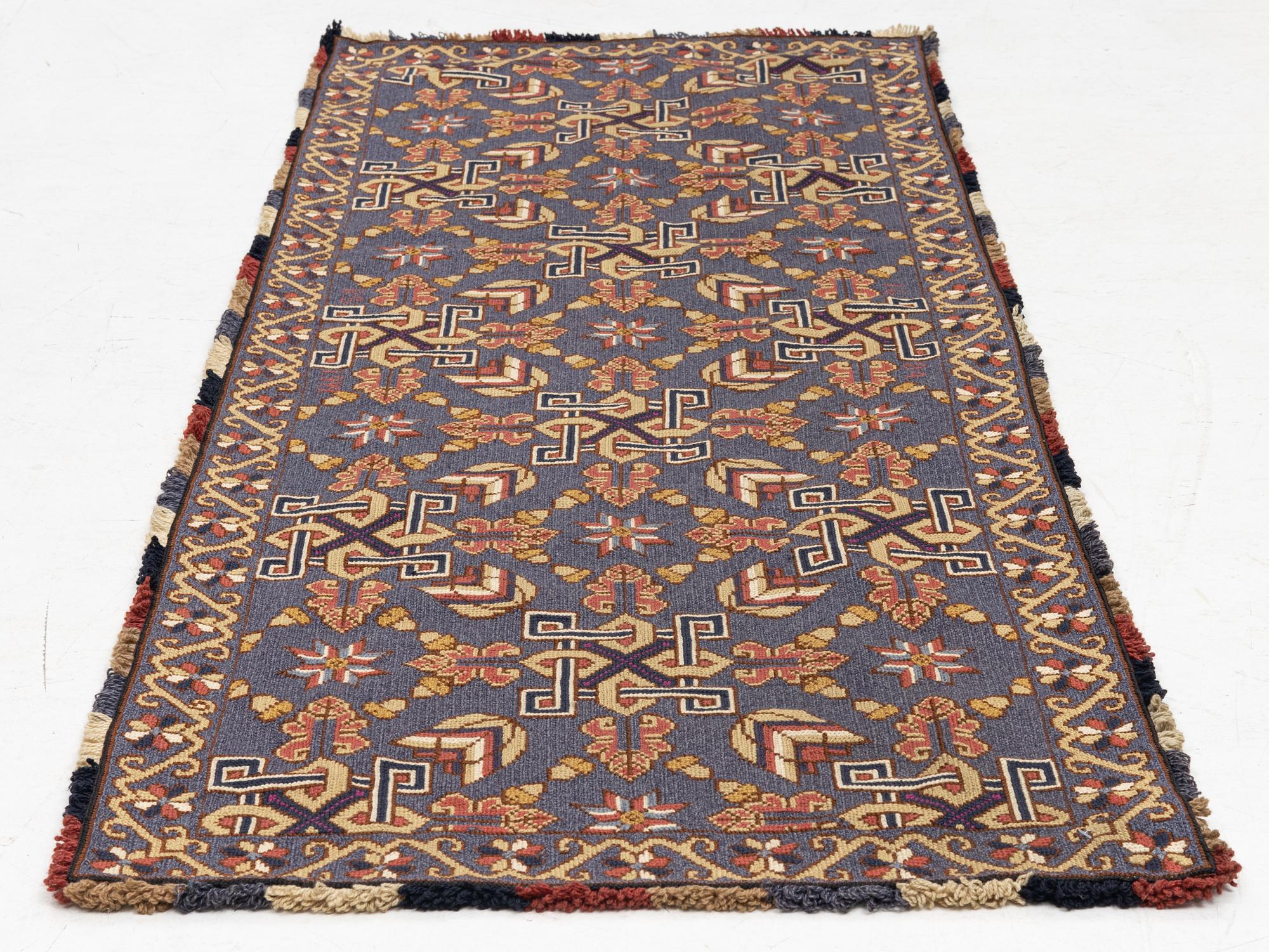 A twizt stich bench cushion from Scania. C 187 x 79 cm Circa 1900.
