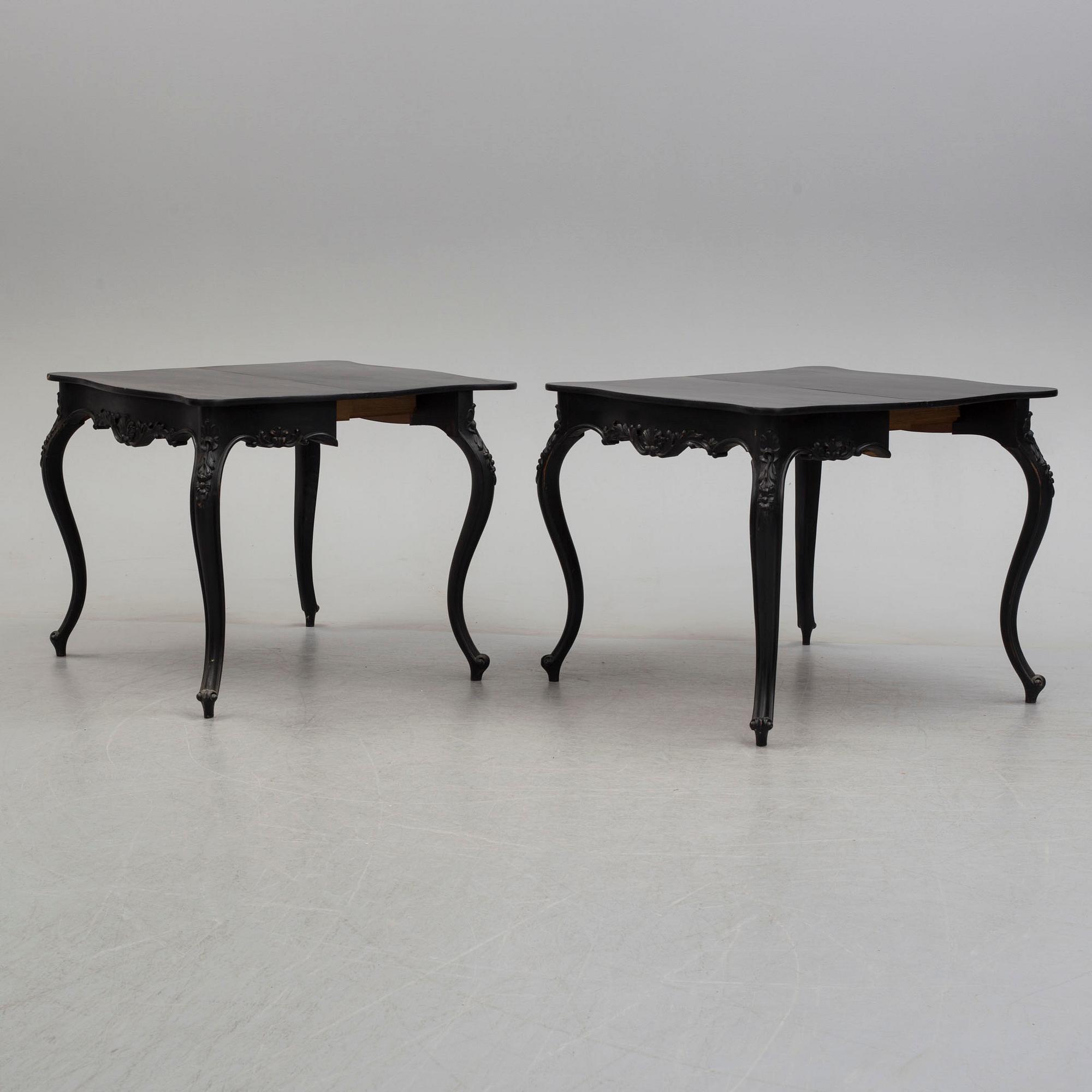 A pair of end of the 19th century new rococo style painted card tables.